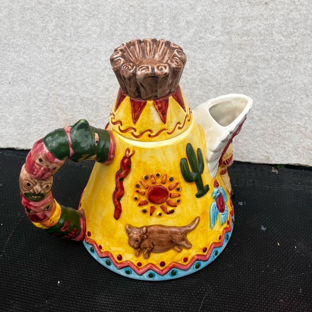93’ Omnibus,OCI (Philippines)Handpainted ceramic Native American teepee teapot.